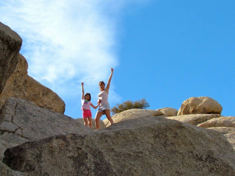 author with daughter hiking