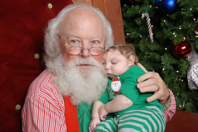 santa and son on chair 