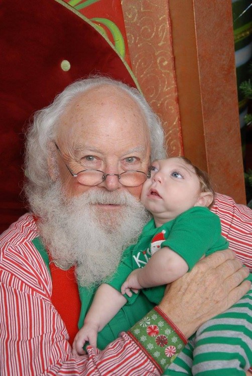 santa holding author's son 