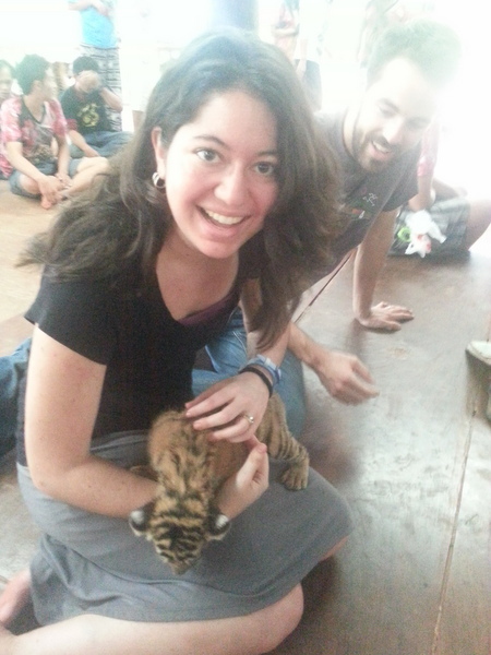 ​Holding a baby tiger in Thailand is a good type of stress.