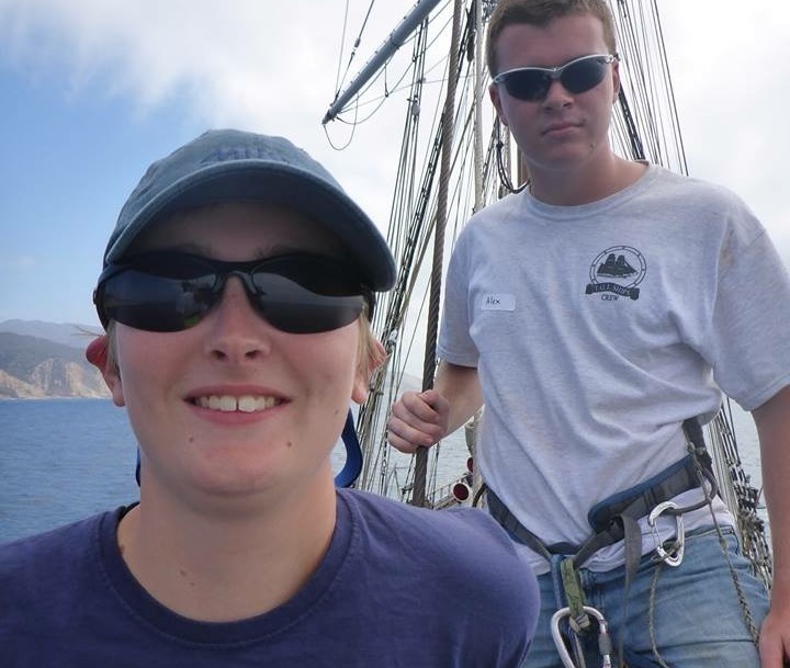 man and woman on sailboat