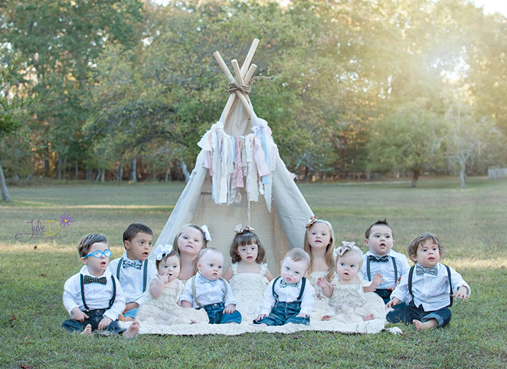 11 Children with Down syndrome pose for a photo