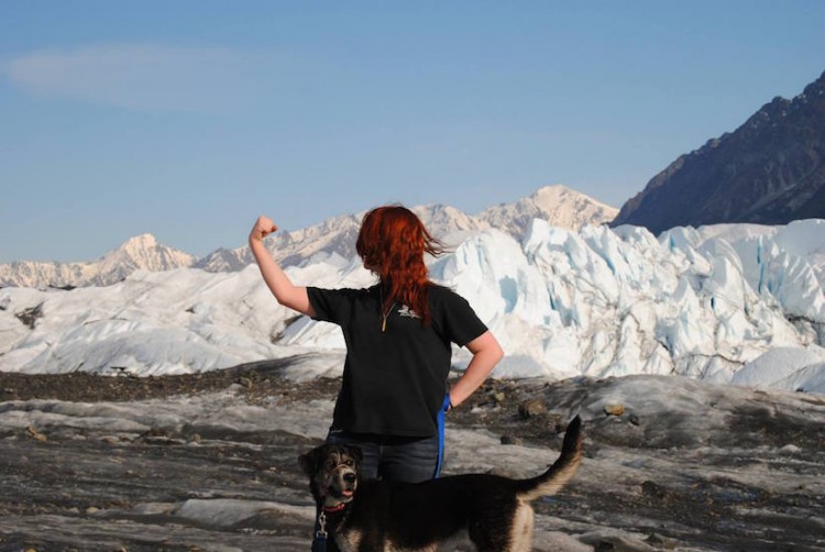 woman in front of glacier