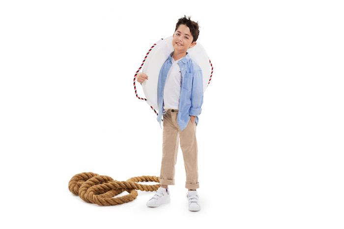 Boy wearing adaptable clothing.