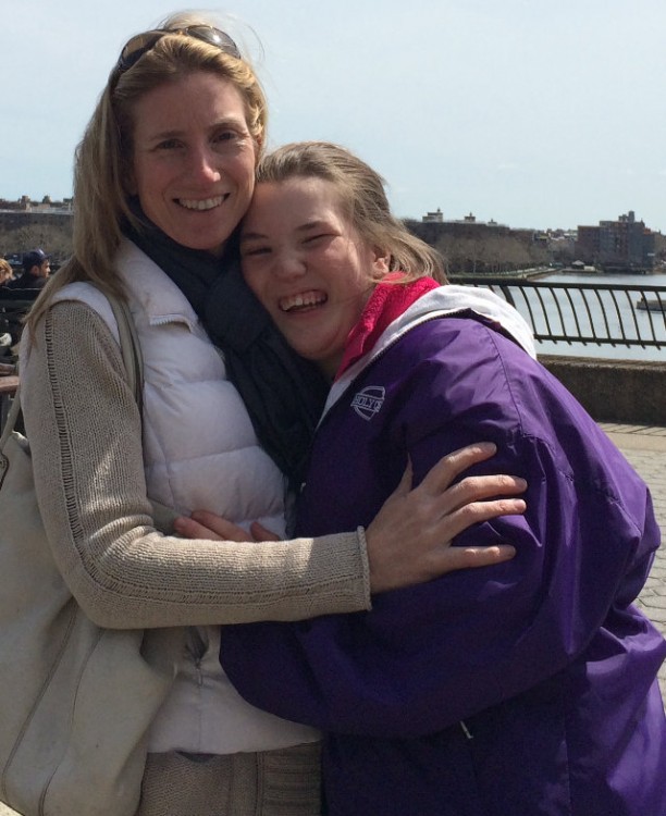 mom and daughter hugging each other