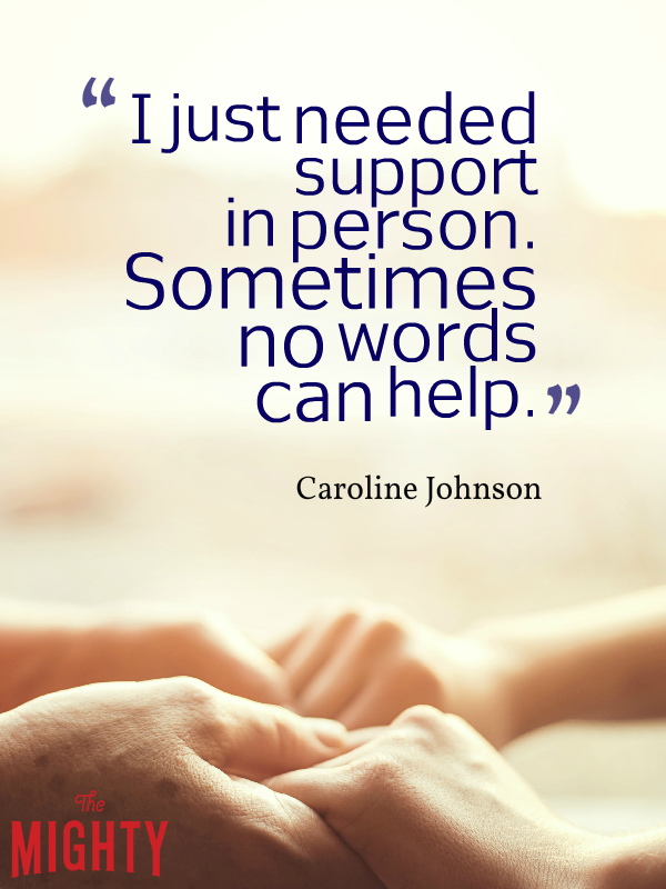 Two people holding each other's hands with the text: "I just needed support in person. Sometimes no words can help"
