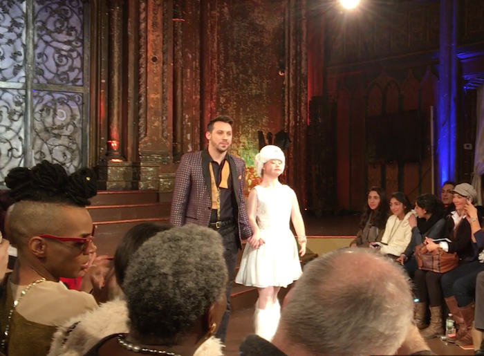 Stuart walking the runway with model