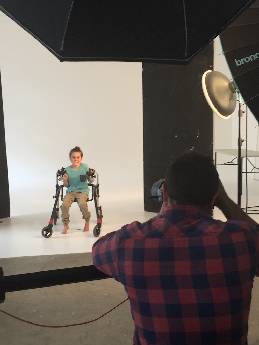 cooper being photographed for kmart