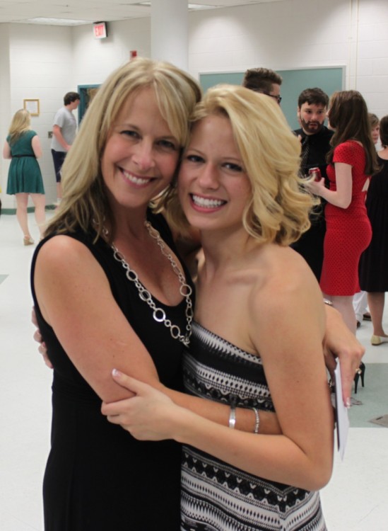 Kelly and her daughter, Brooke, embrace