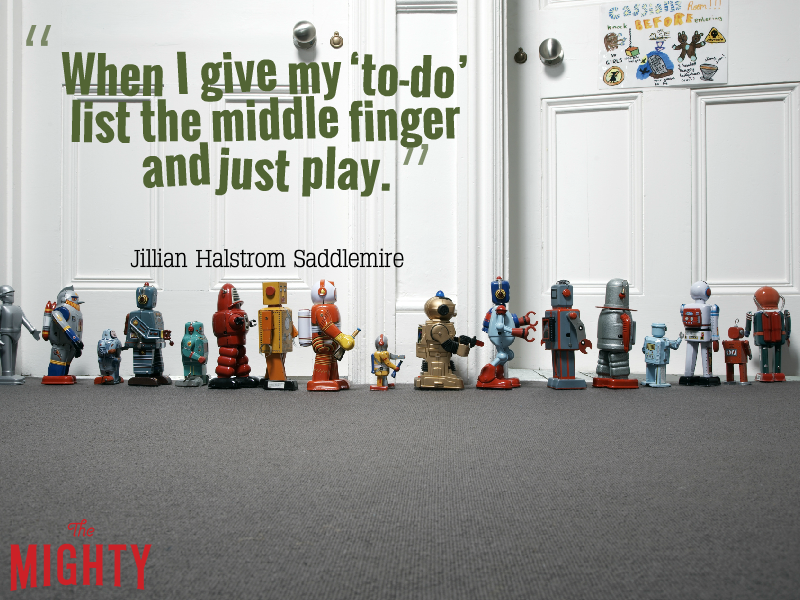 Photo of toys lined up with the text: "“When I give my ‘to-do' list the middle finger and just play."