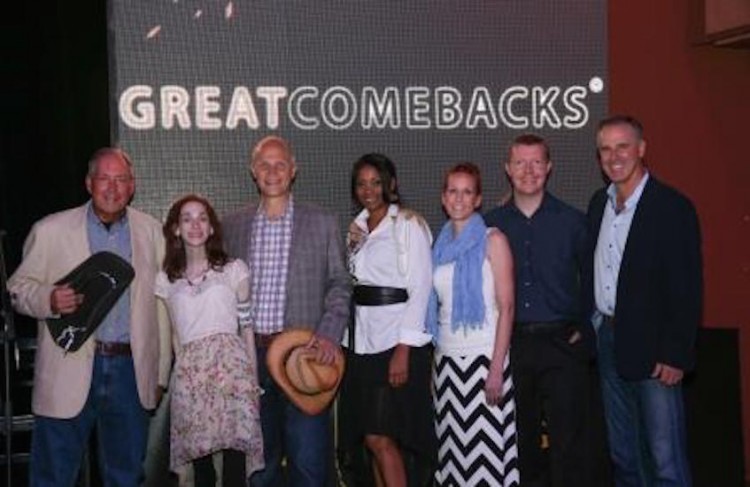 group of people posing in front of sign for great comebacks awards