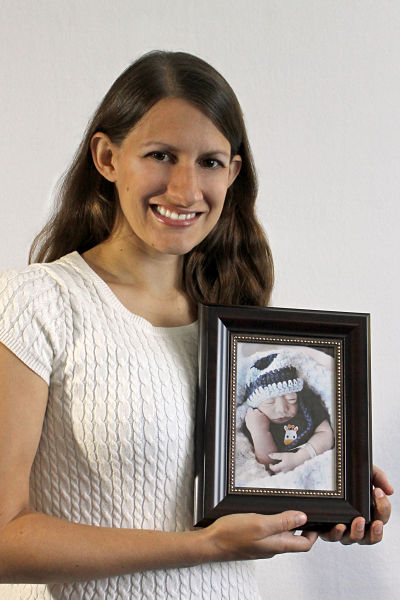 Bethany Conkel with a photo of her son.