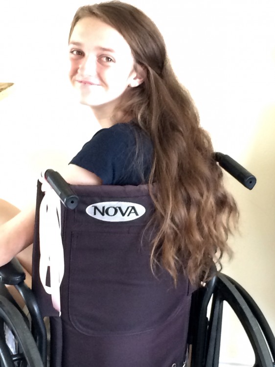 Elizabeth - teenage girl using a wheelchair.