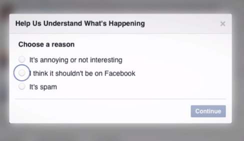 Text box that reads Help Us Understand What's Happening. The options are It's annoying or not interesting, I think it shouldn't be on Facebook, and It's Spam. "I think it shouldn't be on Facebook" is selected. 