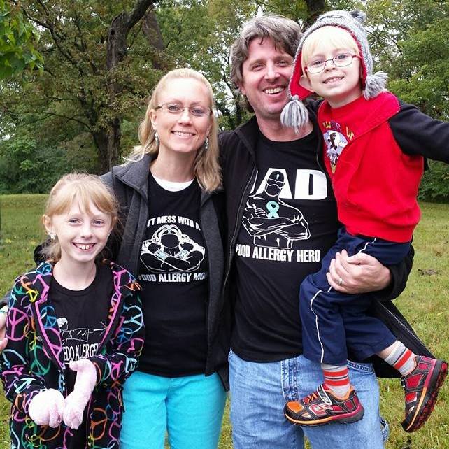 The Soppet family at FARE walk -- mother, father, boy and girl outside.