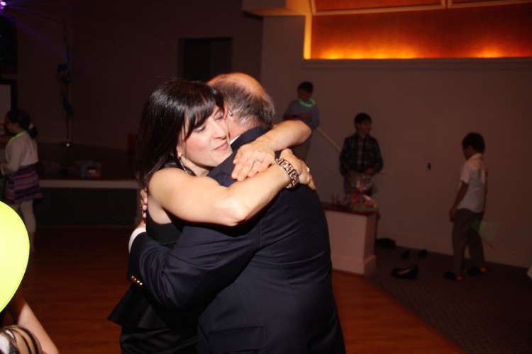 Deborah hugging her father
