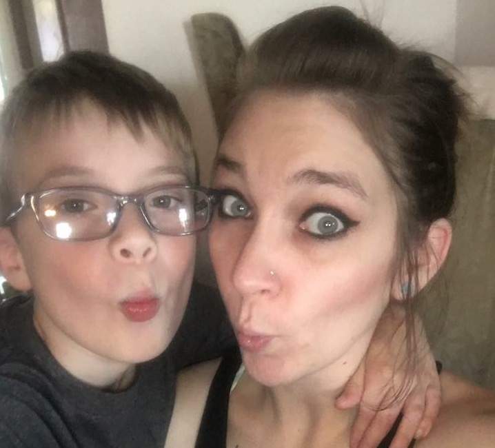 mom and son making funny faces at the camera