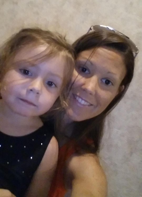 selfie photo of a young girl and her mom