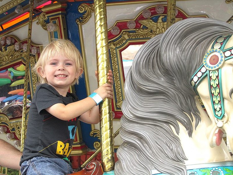 Kathy's son on the carousel