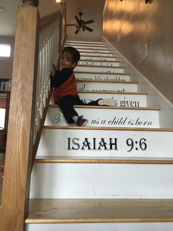 Israel climbing the stairs.