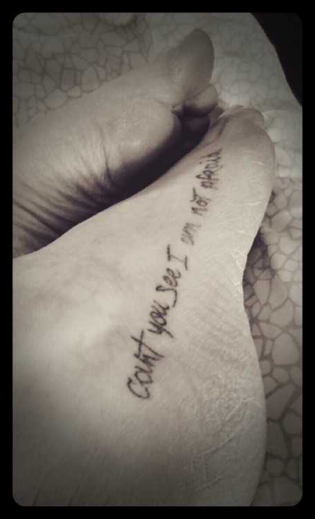 tattoo on foot of words can't you see I'm not afraid