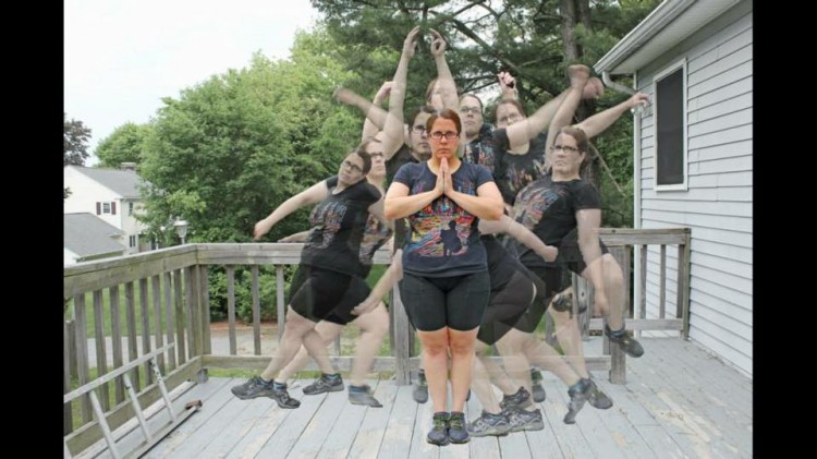 A woman standing with many images of herself on a porch. 