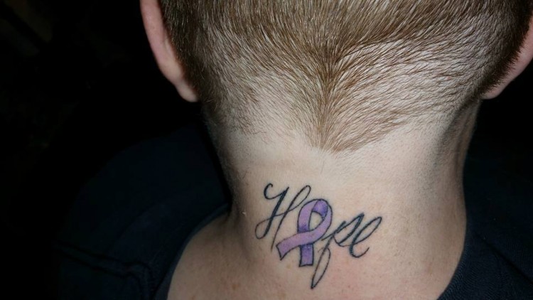 tattoo of hope with purple ribbon