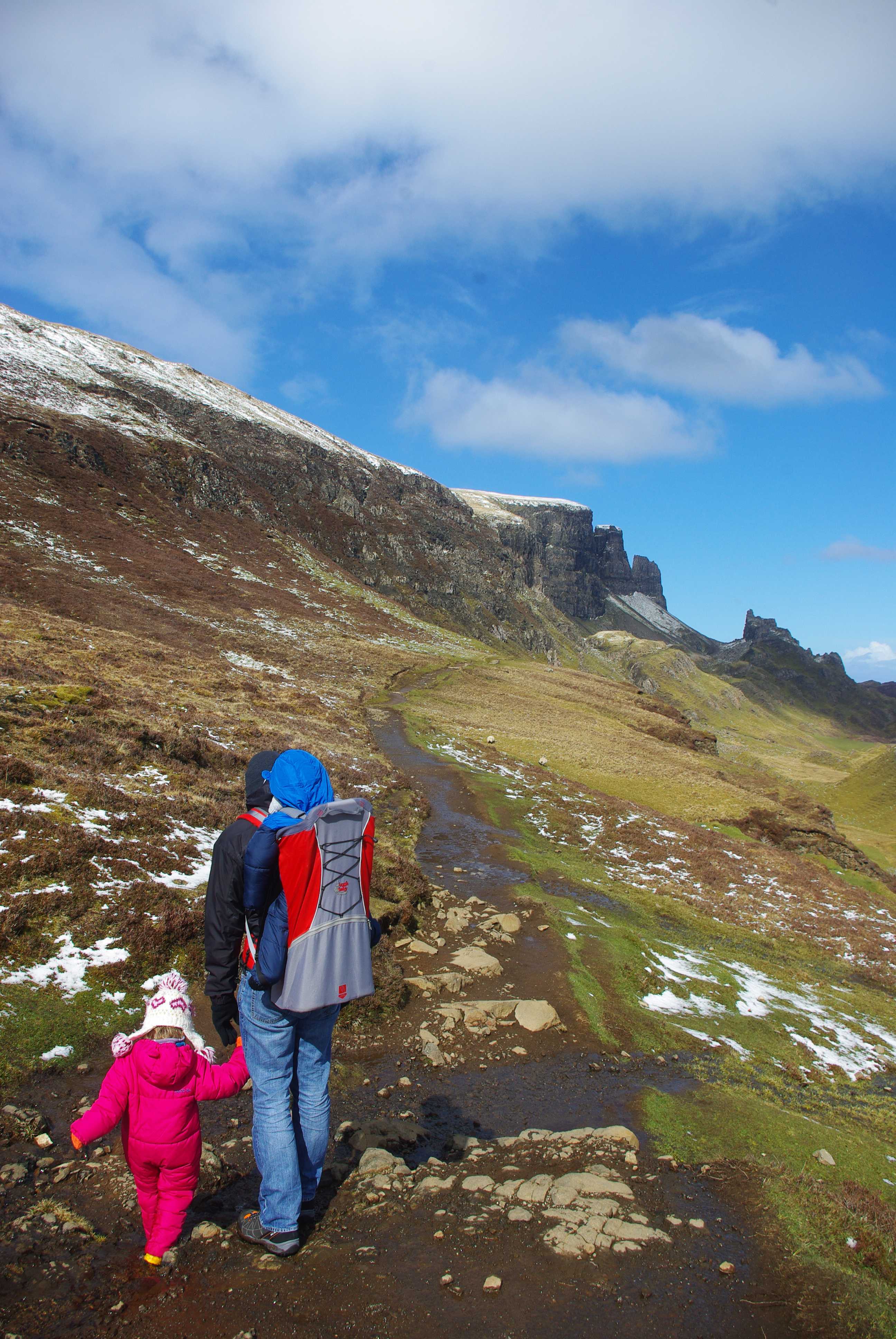 family traveling on a hike