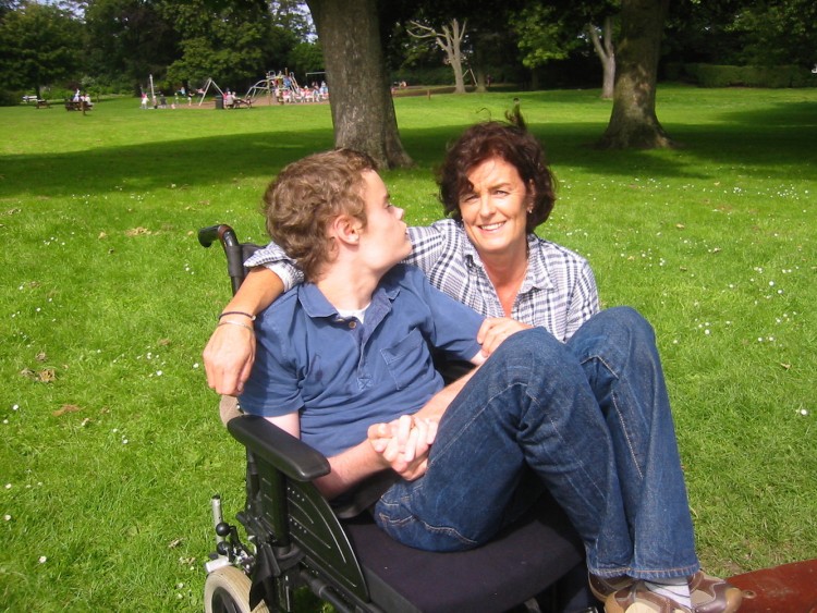 Philippa and her son in a park.