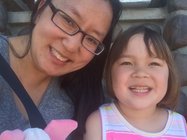 Christine and her daughter smiling.