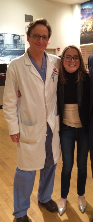 woman standing next to a doctor in white coat