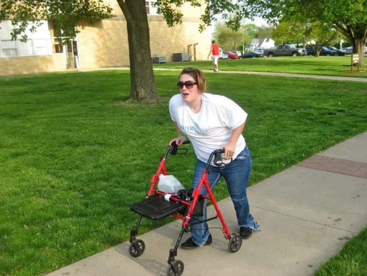 Erin exercising with her walker.