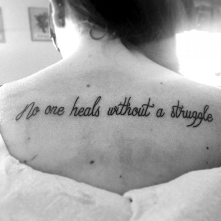 Tattoo reads: No one heals without a struggle.