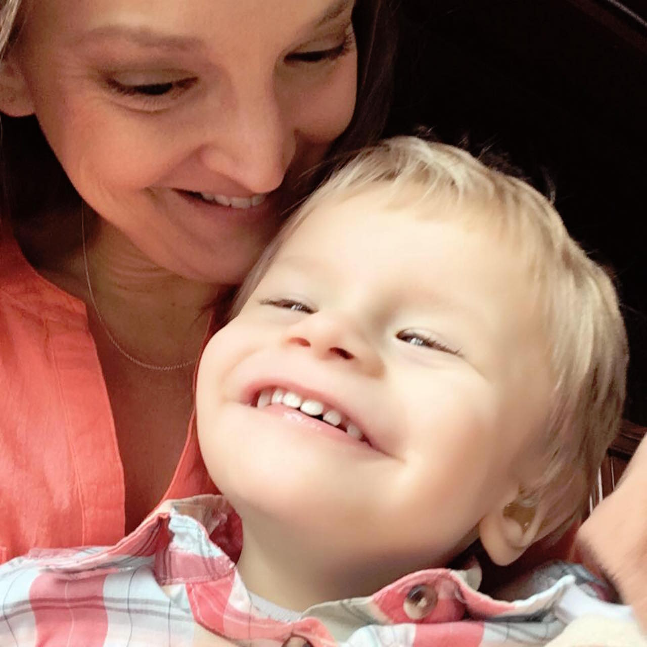 mom and her son christopher smiling