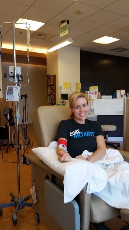 woman in doctor's office getting an infusion