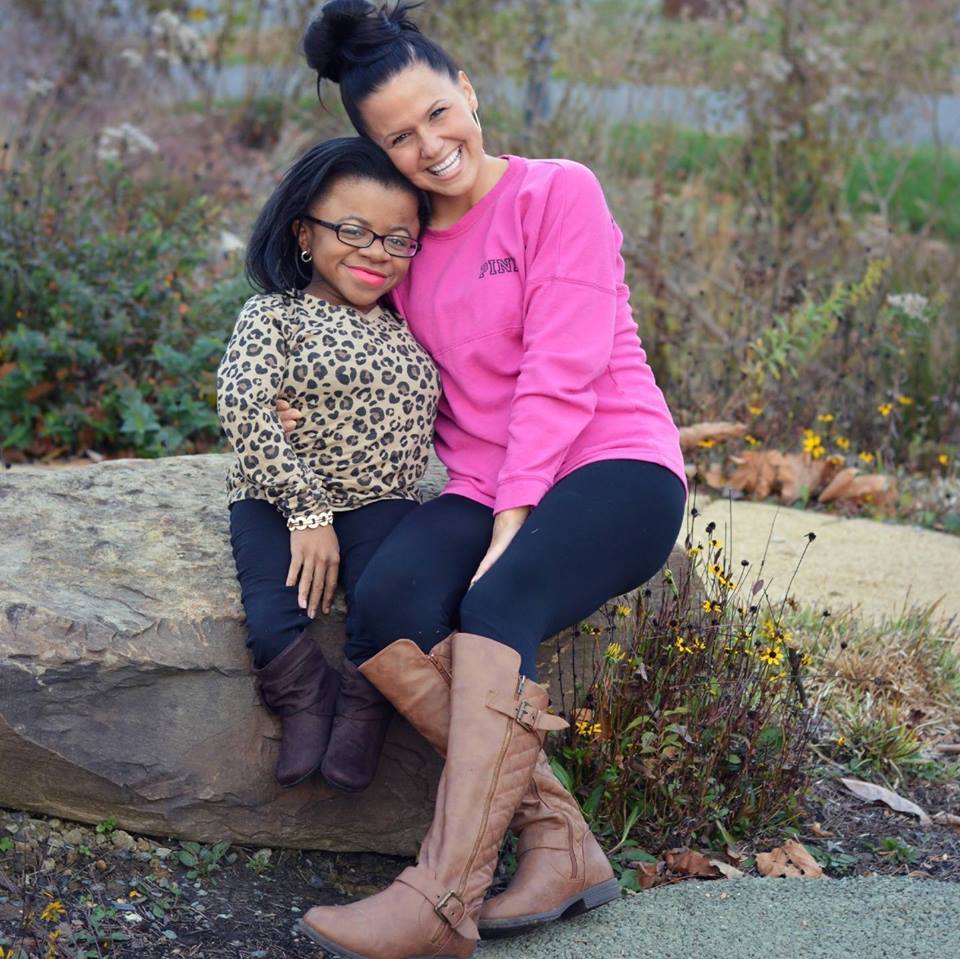 Stephanie Smith poses with one of her subjects.