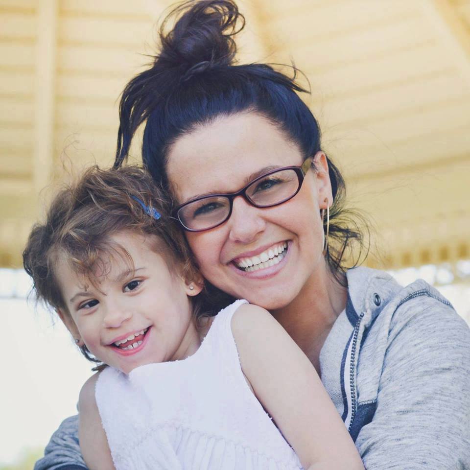 Stephanie Smith poses with one of her subjects.