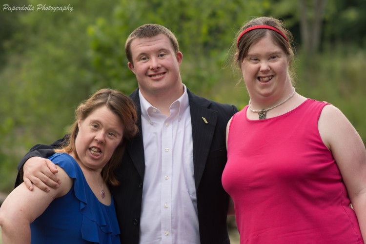 Three adults with special needs