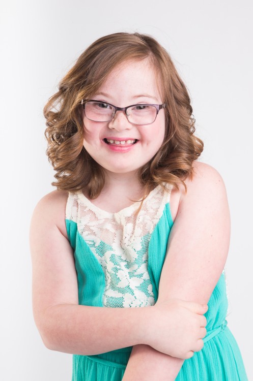 Girl with Down syndrome modeling