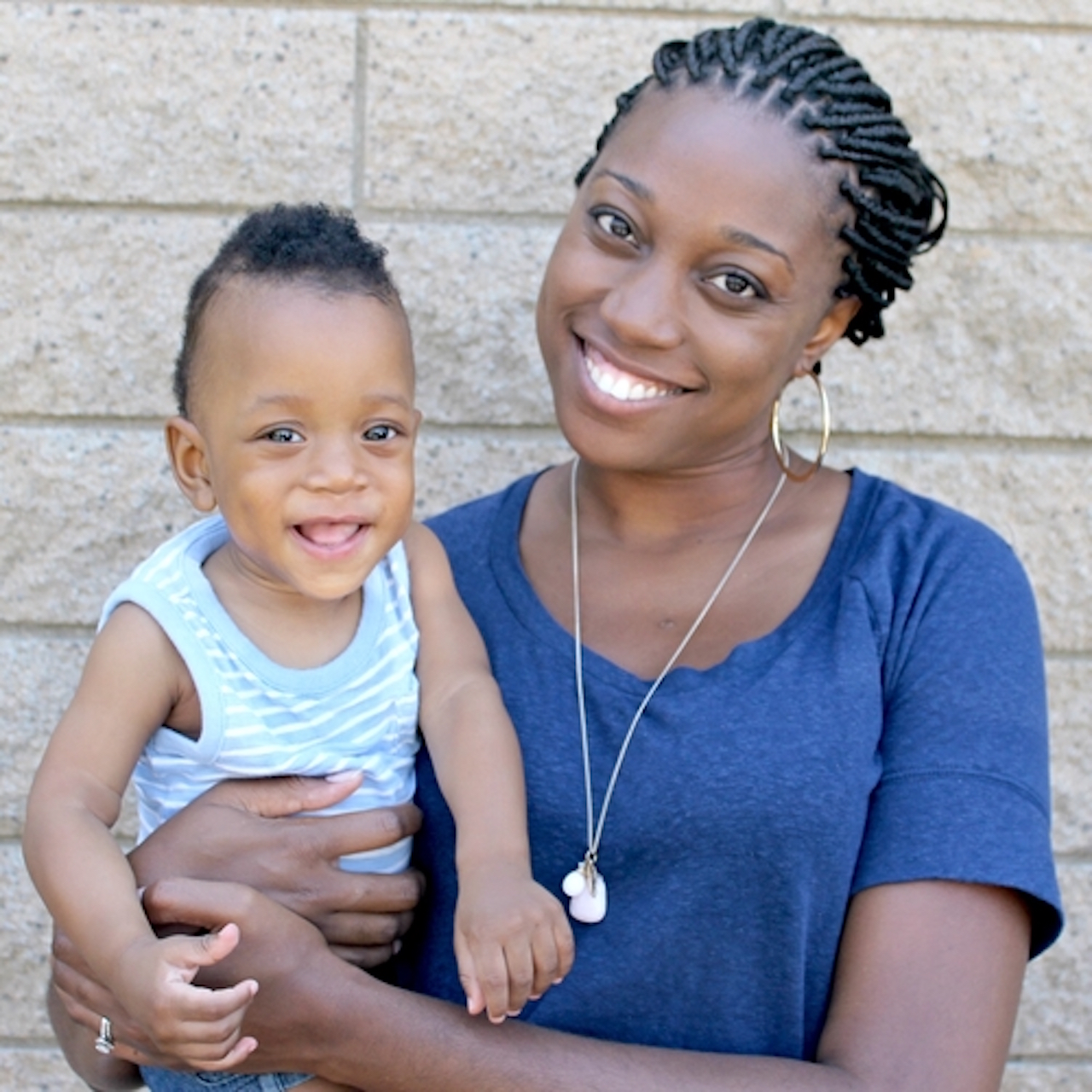 mom and baby smiling