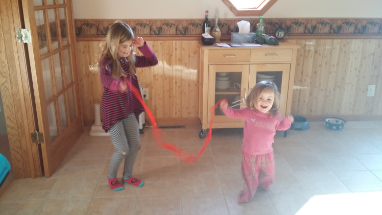 Willow dancing with her sister.