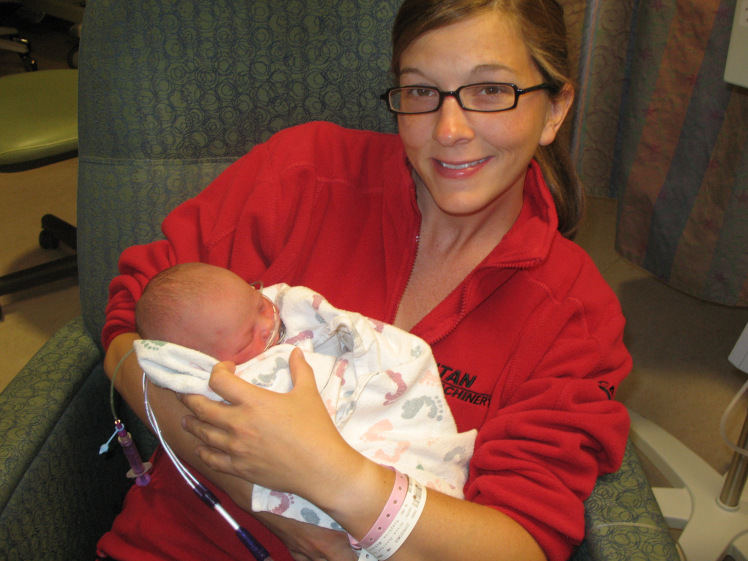 Jennifer holding baby Willow.