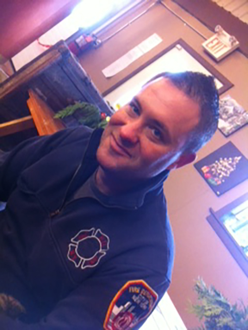 Image of contributor Carl in firefighter uniform