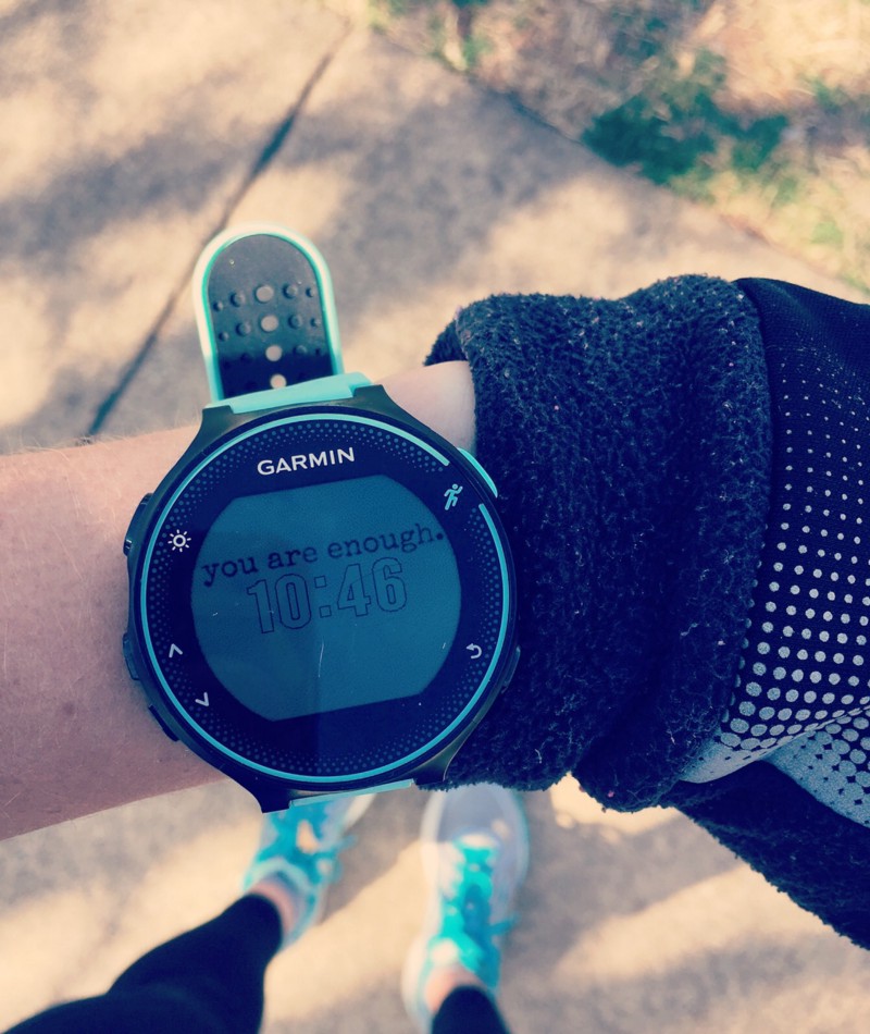 running watch that says you are enough