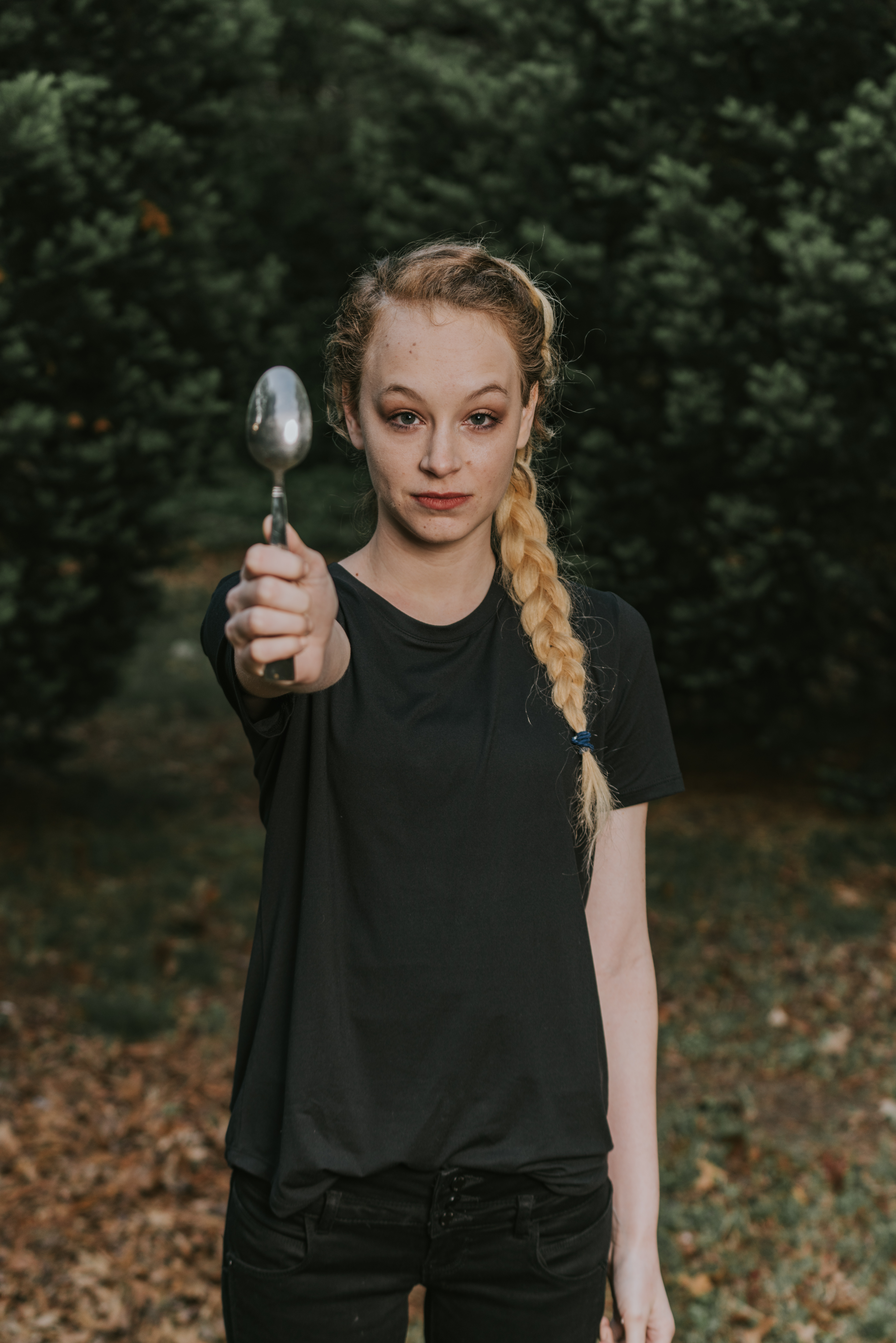 woman holding a spoon