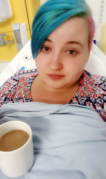 woman drinking tea in the hospital