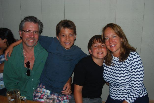 allison moore with husband and two sons