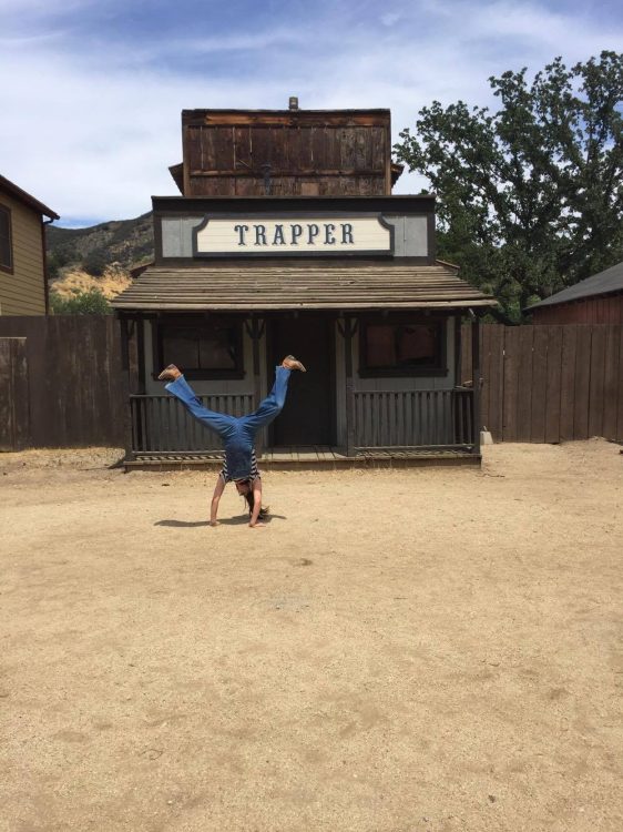 woman doing cartwheels on the set of West World