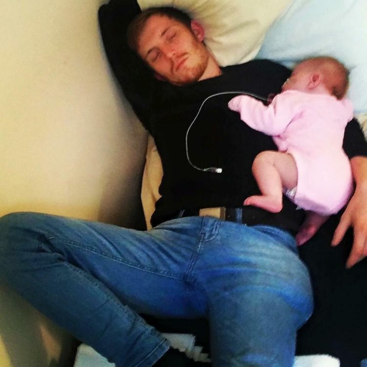 father sleeping with baby daughter the night before her open heart surgery