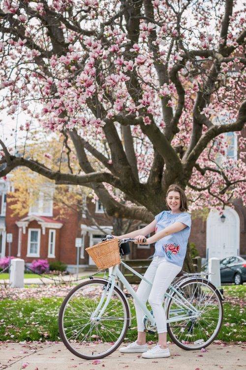 cancer survivor young woman on bike